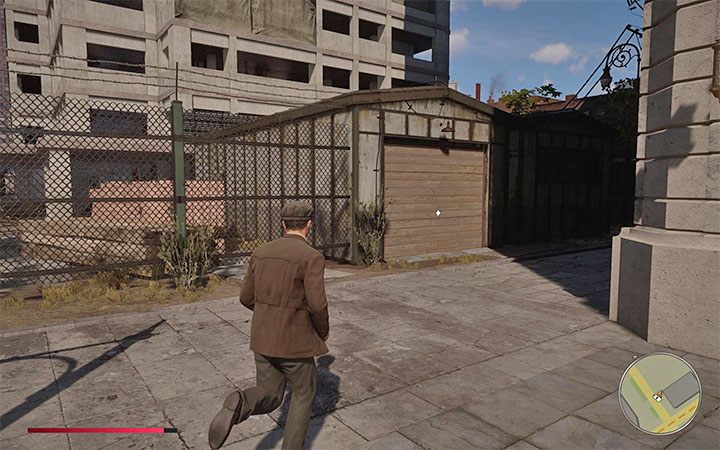 Go around the construction site until you find a garage with a secret vehicle shown in the picture - Mafia Definitive Edition: Fleme Spearr - hidden car, where to find - Cars - Mafia Definitive Edition Guide, Walkthrough