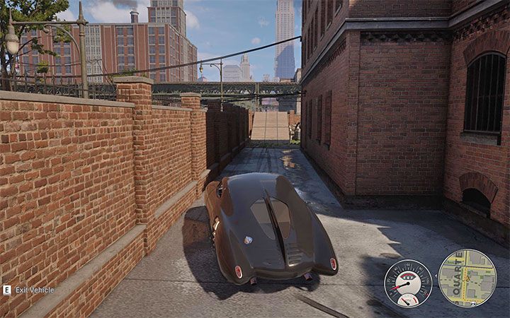 Once you find the car, drive out of the garage and choose a narrow lane between the building and the small wall - Mafia Definitive Edition: Manta Prototyper - hidden car, where to find - Cars - Mafia Definitive Edition Guide, Walkthrough