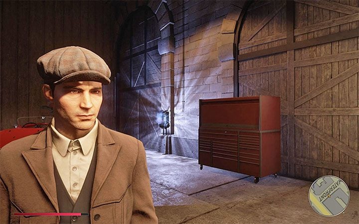By restoring power to the gate, you can now get in the car and drive it out of the warehouse - Mafia Definitive Edition: Trautenberg Sportr - hidden car, where to find - Cars - Mafia Definitive Edition Guide, Walkthrough