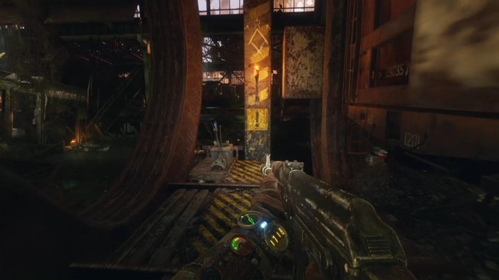 Now go back through the door and walk through the scaffolding until you reach the lever, which moves the mechanism next to it - Metro Exodus: Hangar with a big fish - walkthrough - Volga - Metro Exodus Guide
