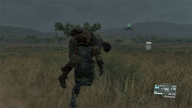 It is a good idea to send the other team member back to the base in the helicopter - Rescuing the ally being held in the camp | Walkthrough - Mission 17 - Rescue the Intel Agents - Metal Gear Solid V: The Phantom Pain Game Guide & Walkthrough