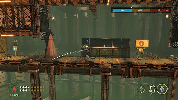 We can test the smoke grenades right away to bypass the scanner to the left of the dumpsters - Oddworld Soulstorm: Crossing Tank Row 2D, Phat Station - walkthrough - 6: Phat Station - Oddworld Soulstorm Guide