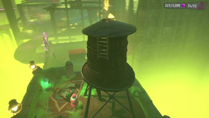 To get to this secret, you have to jump off the neon sign next to the building - Psychonauts 2: Nuggets of Wisdom, Strike City - where to find? - Strike City - Psychonauts 2 Guide