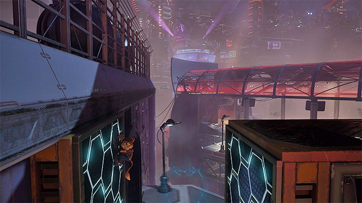 After the fight, look around for a rift to pull yourself to - Ratchet & Clank Rift Apart: Marketplace and factory exploration - walkthrough - Nefarious City - Ratchet & Clank Rift Apart Guide