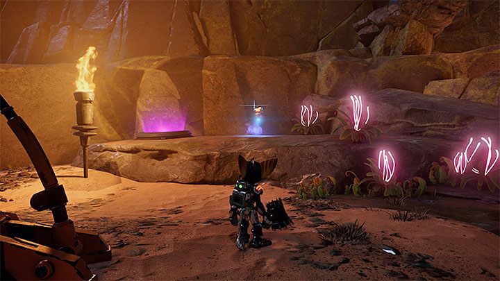 You can find the Spybot on your first visit to Ardolis - Ratchet & Clank Rift Apart: RYNO, the ultimate weapon - Spyobots list - Secrets and Collectibles - Ratchet & Clank Rift Apart Guide