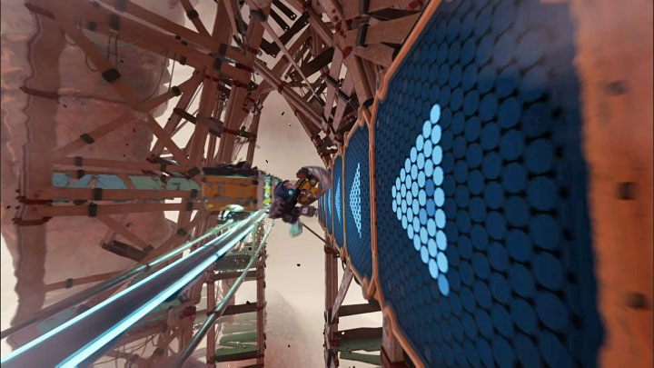 A little further on, there will be another obstacle in the form of a row of carriages over which you cannot safely jump - Ratchet & Clank Rift Apart: Run away from Fixer - walkthrough - Torren IV - Ratchet & Clank Rift Apart Guide