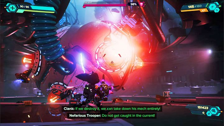 The second battle will take place next to a large mechanical heart of the Imperial Power Suit - Ratchet & Clank Rift Apart: Begin the finale and defeat the final boss - walkthrough - Final confrontation - Ratchet & Clank Rift Apart Guide