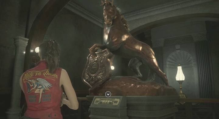 The unicorns statue behind the library. - Collect 3 medallions task | Police station in Resident Evil 2 - Walkthrough - Resident Evil 2 Guide