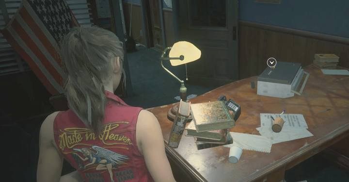 A 9V battery. - Collect 3 medallions task | Police station in Resident Evil 2 - Walkthrough - Resident Evil 2 Guide