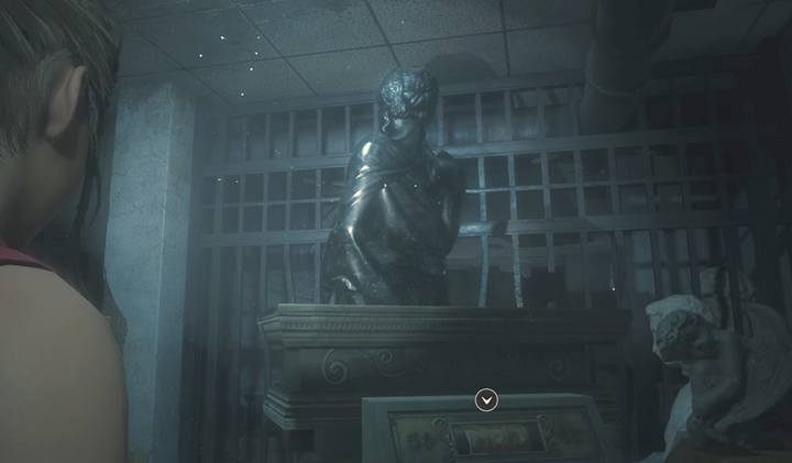 The ladys statue with the third medallion. - Collect 3 medallions task | Police station in Resident Evil 2 - Walkthrough - Resident Evil 2 Guide