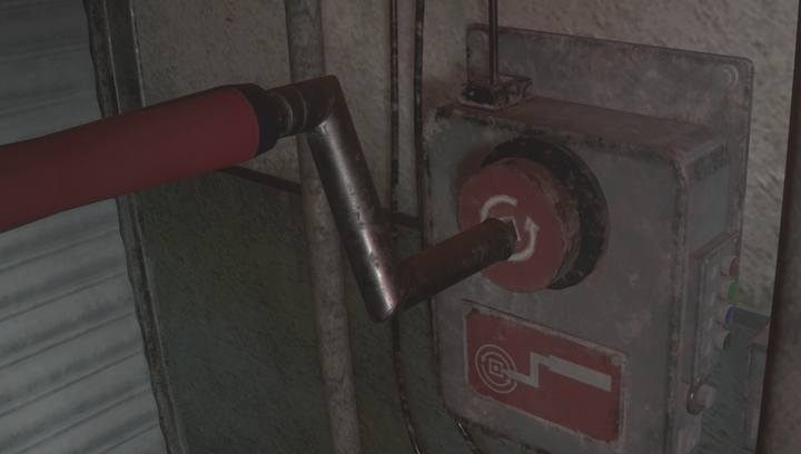 The place where you have to insert the crank. - Police parking garage - Leons | Police station in Resident Evil 2 - Leons path - Resident Evil 2 Guide