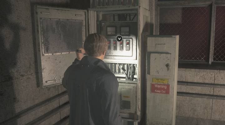 The electric box with switches. - Police parking garage - Leons | Police station in Resident Evil 2 - Leons path - Resident Evil 2 Guide