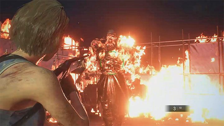 After the fuel tank is destroyed, you advance to the second phase of the fight - you must attack and avoid the burning Nemesis - Resident Evil 3: Demolition site walkthrough - Story walkthrough - Resident Evil 3 Guide