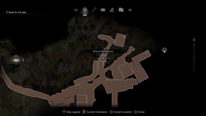 You will be able to open the last of the three Doors with Insignia only in Chapter 4 - Resident Evil 4 Remake: How to open Doors with Insignia? - Campaign - Resident Evil 4 Remake Guide