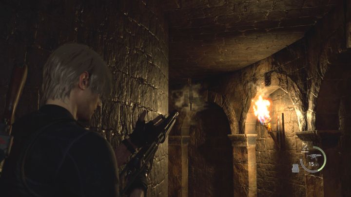 Further into the catacombs you will find machine guns attached to the ceilings - Resident Evil 4 Remake: How to defeat Jack Krauser again (Chapter 14)? - Bosses - Resident Evil 4 Remake Guide
