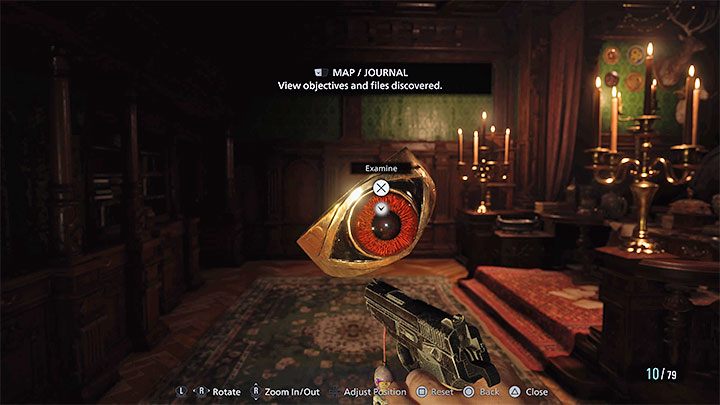 You will reach a statue of a woman holding a baby in her hands - Resident Evil Village: Exploring the Castle Chambers - walkthrough, solution - Dimitrescu Castle - Resident Evil Village Guide