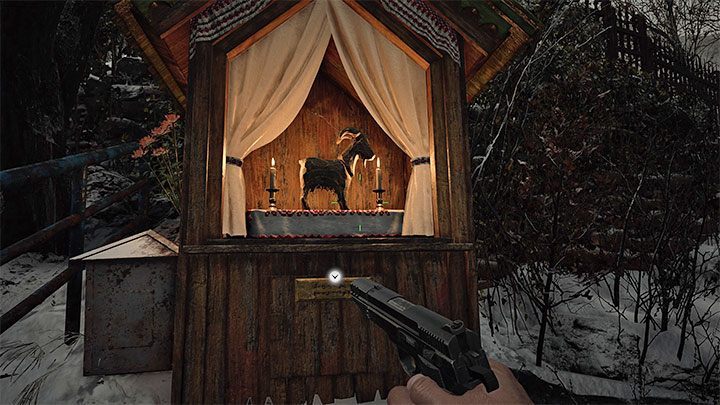 1/20 The goat is in a clearly visible location on the altar (Graveyard) in the central part of the village - Resident Evil Village: Goats of Warding - descriptions, full list - Secrets & Collectibles - Resident Evil Village Guide