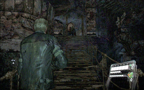 Keep moving forwards until you encounter a fat zombie on one of rope bridges - Chapter 3 - The Center of the Earth | Leons campaign - Leons campaign - Resident Evil 6 Game Guide