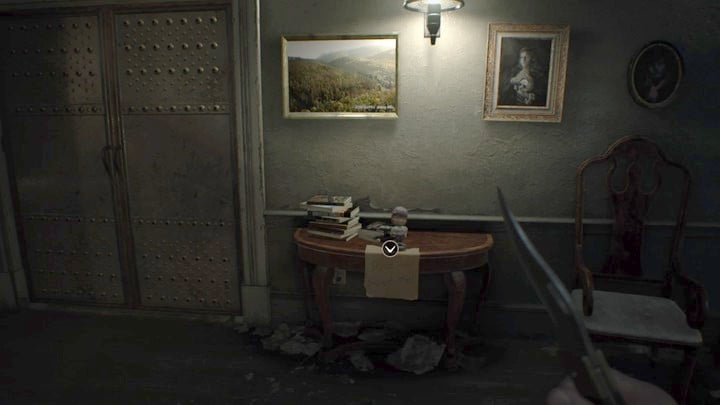 An easy to spot statuette in the main hall. - Resident Evil 7: Main House, Basement Map - Secrets - Secrets and Maps - Resident Evil 7 Guide, Walkthrough