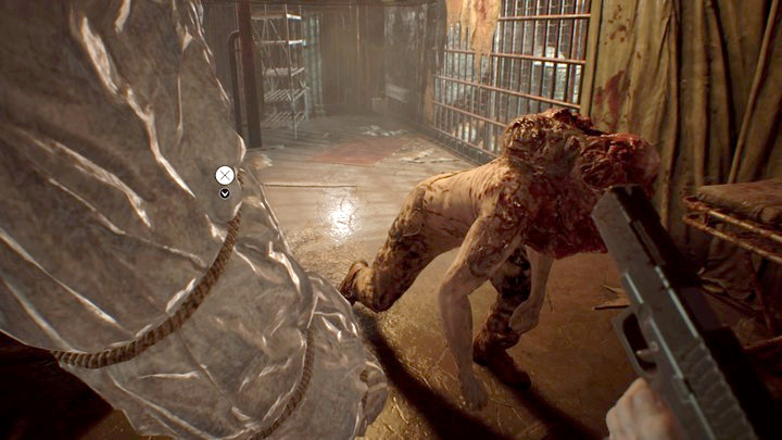 When Jack lean in, try to push body bags at him - Resident Evil 7: Main House: Basement walktrough - Resident Evil VII Walkthrough - Resident Evil 7 Guide, Walkthrough