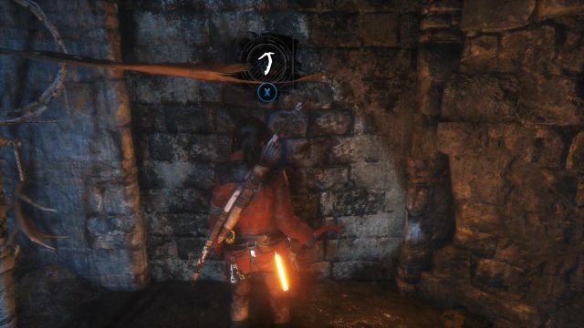 Finally, find the weakened fragment of the brick wall and smash it with the hatchet to progress towards the ice grotto - Rise of the Tomb Raider: Explore the cave to find an exit, walkthrough - Siberian Wilderness - Best Laid Plans - Rise of the Tomb Raider Guide