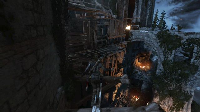 Walk over the plank towards the collapsed bridge - Rise of the Tomb Raider: Breach the gate to the Tower Courtyard, walkthrough - To the Tower - Rise of the Tomb Raider Guide