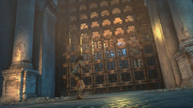 After you reach the gate, it will be shut close and you will get under fire from the trebuchet at the other side of the location - Rise of the Tomb Raider: Get through the first gate, walkthrough - The Frozen City - Rise of the Tomb Raider Guide