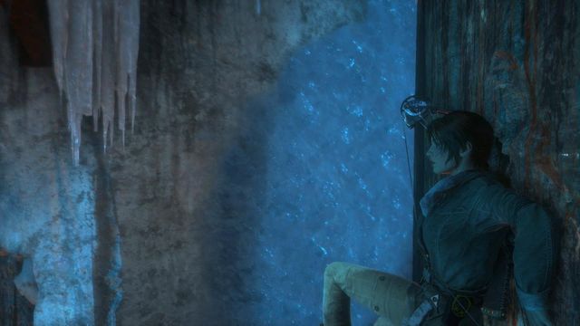 Jump up to reach the other arrow and from there, jump towards the ice wall - Rise of the Tomb Raider: Get through the first gate, walkthrough - The Frozen City - Rise of the Tomb Raider Guide