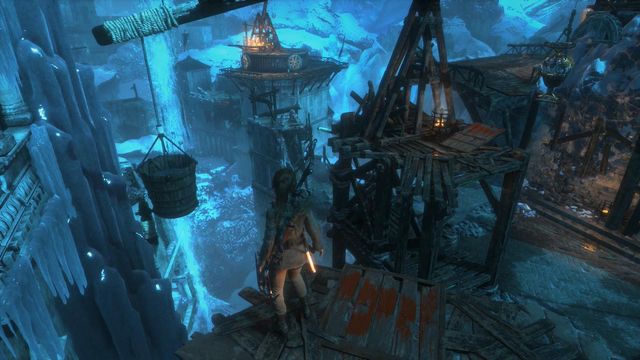 Now, jump onto the base of the balance beam and jump down onto the metal container - Rise of the Tomb Raider: Go to the other trebuchet, walkthrough - Gate Crasher - Rise of the Tomb Raider Guide