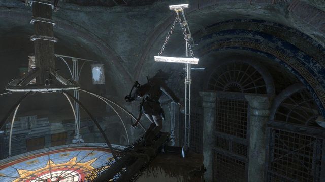 While on the turning beam, you need to jump over towards the beam hanging on chains - Rise of the Tomb Raider: Open the entrance to Kitezh, walkthrough - Path of the Deathless - Rise of the Tomb Raider Guide