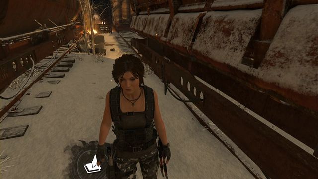 Between railway cars, right next to the fence - Rise of the Tomb Raider: Survival Caches, Soviet Installation secrets, map, tips - Soviet Installation - Rise of the Tomb Raider Guide