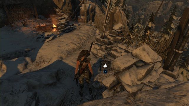 At the wall, in Camp Overview - Rise of the Tomb Raider: Survival Caches, Soviet Installation secrets, map, tips - Soviet Installation - Rise of the Tomb Raider Guide