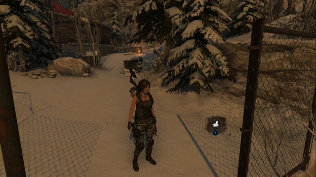 At the fence, close to the campfire at the Communications tower camp - Rise of the Tomb Raider: Chests, crypt treasures, Soviet Installation secrets - Soviet Installation - Rise of the Tomb Raider Guide