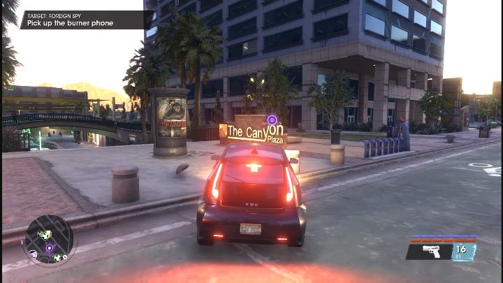 When you reach the location marked on the map, you will see a stationary phone placed on a sign next to the skyscraper - Saints Row 2022: Foreign Spy - how to complete contract? - Wanted - Saints Row Guide, Walkthrough