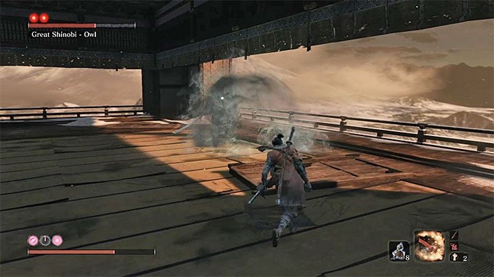 An unusual attack of the boss is hurling a container with poison at you - Great Shinobi Owl | Sekiro Shadows Die Twice Boss Fight - Bosses - Sekiro Guide and Walkthrough