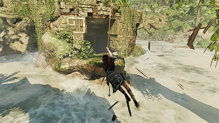Reach the opposite side of the wall, slide down the rope and land on the stone ledge surrounded by water - Exploring of the temple - Eye of the Serpent; Empty-Handed - Mountain Temple Cenote - Shadow of the Tomb Raider Game Guide