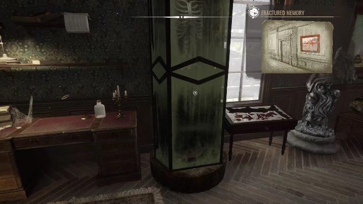 Next to the other desk you'll find a man's skeleton locked behind glass - Sherlock Holmes Chapter One: A Mothers Love, cabinet of curiosities - walkthrough - Motherly love #4 - Sherlock Holmes Chapter One Guide