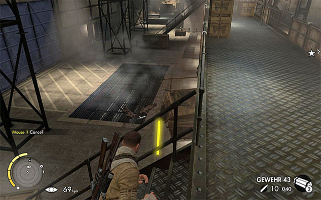 The field of vision, of the abovementioned halftrack, is vast, which means that you need to watch out to prevent being spotted - Sniper Elite 3 Afrika: Planting an explosive on the tank - Sniper Elite 3 Afrika: Mission 8 - Ratte Factory - Sniper Elite III: Afrika Game Guide