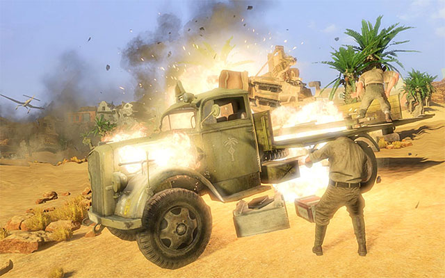 Hitting the fuel tank causes a huge explosion. - Sniper Elite 3 Afrika: Destroying heavy artillery - Sniper Elite 3 Afrika: Mission 1 - Siege of Tobruk - Sniper Elite III: Afrika Game Guide