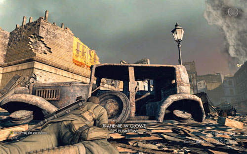 Crawl further, behind the car - try not to get noticed by the soldier walking on the roof of the building - Mission 10 - Brandenburg Gate - p. 1 - Walkthrough - Sniper Elite V2 Game Guide & Walkthrough