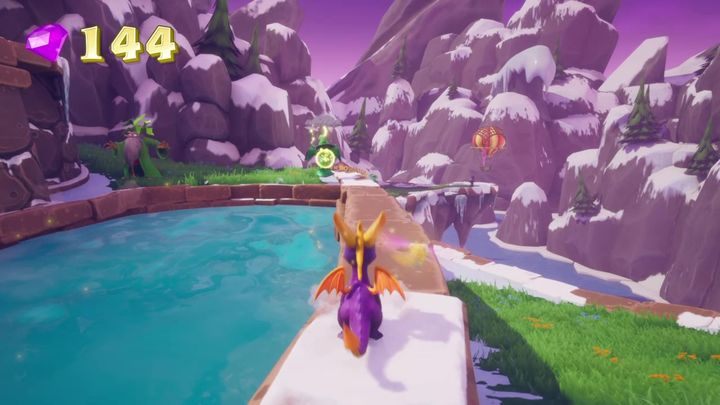 If you follow the lower path from the clearing, you will find a green druid constantly moving the platform located in the middle of the pond - Magic Crafters | Spyro The Dragon Walkthrough - Magic Crafters - Spyro Reignited Trilogy Guide