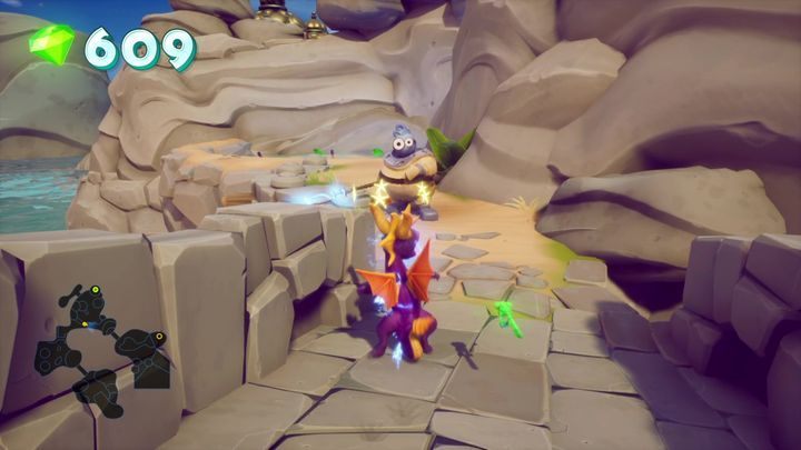 You will sail out in something that resembles a stone arena - Sunny Beach | Spyro 2 Riptos Rage Walkthrough - Summer Forest - Spyro Reignited Trilogy Guide