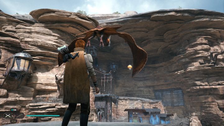 In the new location, Cal can grab onto a relter and fly to a lower shelf with an abandoned hut - Jedi Survivor: Reaching the Caves of PhonQi on Koboh - Puzzles - Star Wars Jedi Survivor guide