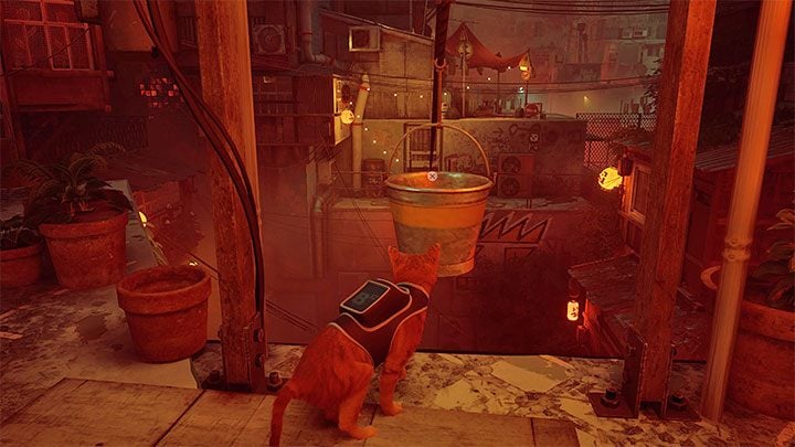 After watching the cutscene, approach the shutter with Momo standing next to it - Stray: The Slums, Chapter 4 - walkthrough - Walkthrough - Stray Guide, Walkthrough