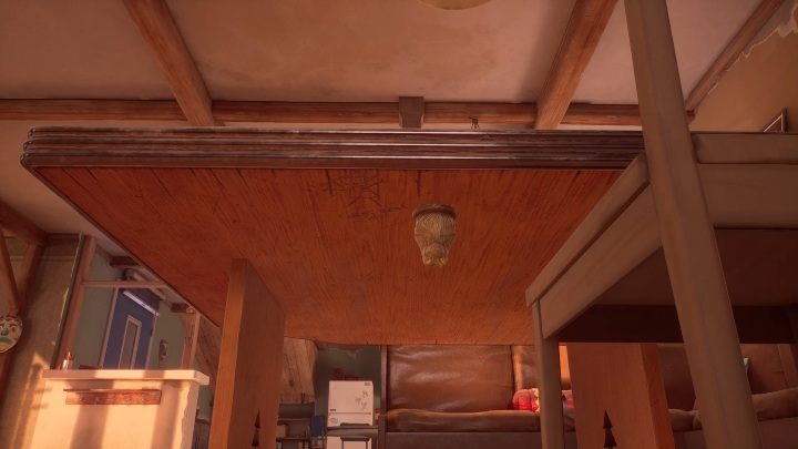 Right under the table there is a figurine - Tell Me Why: Housekeeping, walkthrough - Chapter 2 Family Secrets - Chapter 2 Family Secrets - Tell Me Why Guide, Walkthrough