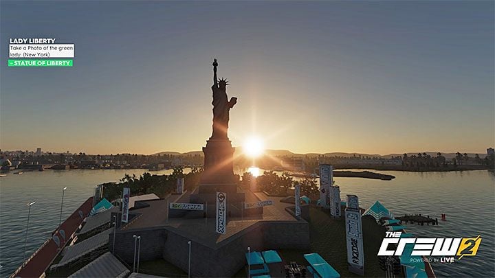 Description: Take a photo of the green lady (New York) - The Crew 2: Album - Street Racing - The Crew 2: Photo Ops - The Crew 2 Game Guide