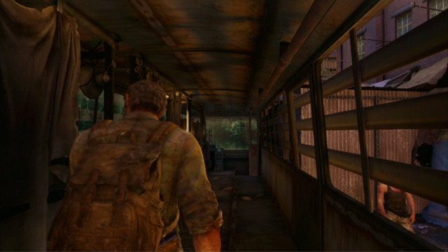 Start by turning left and keep straight ahead, until you reach the other end of the bus - The Last of Us: The Slum, The Quarantine Zone Walkthrough, map - The Quarantine Zone - The Last of Us Guide