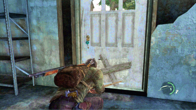 A bit further, there is a building and a door with a door with a pet flap in it - The Last of Us: Graveyard, Bills Town Walkthrough - Bills Town - The Last of Us Guide