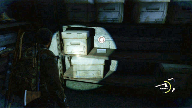 It is to the right of Ellies backpack - The Last of Us: Lakeside Resort, Artifacts and pendants - Artifacts and pendants - The Last of Us Guide