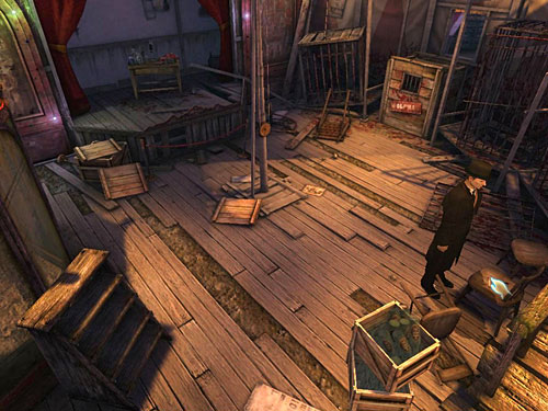 You see a crank on the table, right of entrance - Take Care of the Second Guard | A Grand Final in the Fun Fair - A Grand Final in the Fun Fair - The Testament of Sherlock Holmes Game Guide